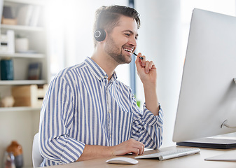 Image showing Happy, customer service and consultant or man in call center speaking online for technical support, advice or help. Employee, talking and consulting person in London working in crm for tech startup