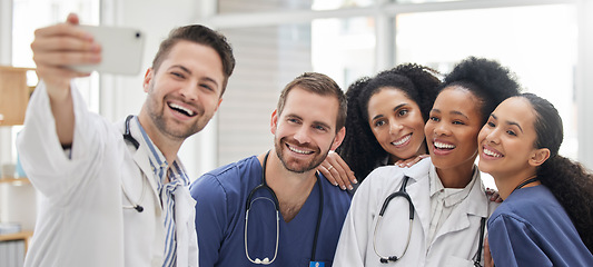 Image showing Doctor, selfie and group with smile for social media and profile picture in hospital. Healthcare, nurse staff and clinic with teamwork, collaboration and happy smile from medical work and employees