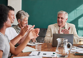 Image showing Business people, clapping and celebrate success in a meeting with a smile, pride and teamwork. Corporate men and women group applause in office for company growth, achievement and win with diversity