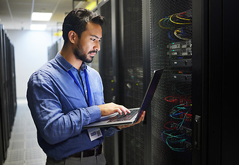 Image showing Man, engineering laptop and data center, server room inspection or system solution, coding and business network. IT person on computer for tech upgrade, gdpr programming and hardware problem solving