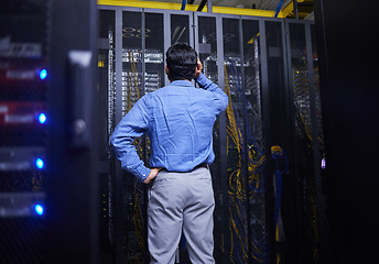 Image showing Server room, cables or confused man with hardware for cybersecurity glitch or software solution. Doubt, man or back of stressed male engineer fixing network for information technology or IT support