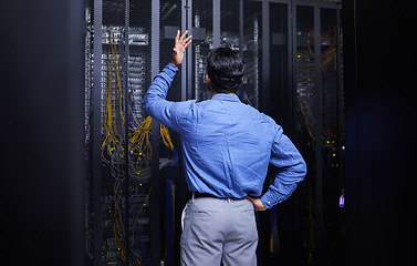 Image showing Server room, stress or male technician with hardware or cables for cybersecurity glitch or machine problem. Doubt, risk or back of confused man fixing network for information technology or IT support