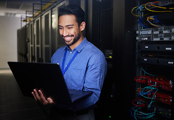 Image showing Man, server room and computer for happy programming, system solution and data center, coding or cybersecurity. Business person, laptop and engineering network, gdpr software and backup or maintenance