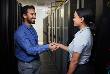 Image showing Handshake, partnership or happy people in server room of data center for network help with IT support. B2b deal agreement, teamwork or engineers shaking hands together in collaboration for solution