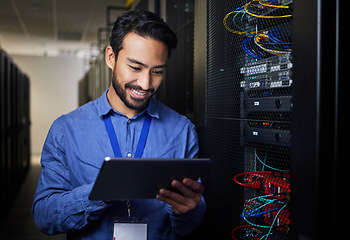 Image showing Man, tablet and server room, programming or coding for cybersecurity, information technology and data protection backup. Happy engineering person on digital software and hardware solution in basement