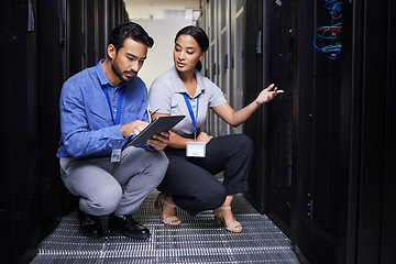 Image showing People, talking and technician in server room with tablet for cybersecurity, update or team problem solving in data or coding. Engineer, teamwork and working with error in information technology code