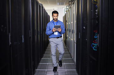 Image showing Tablet, man and engineer in data center on research for programming on app. Information technology, inspection and technician in server room reading, network maintenance or typing code for software