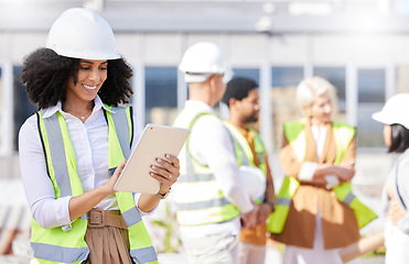 Image showing Tablet, architecture and a black woman construction worker on a building site with her team in the city. Technology, planning and safety with a female designer reading a blueprint on the internet