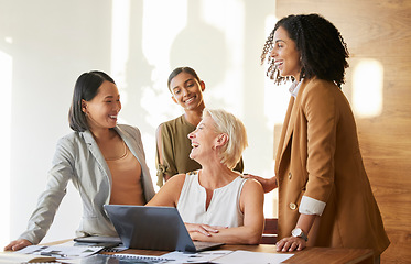 Image showing Business women, planning and teamwork on laptop for marketing meeting, collaboration and funny presentation in office. Professional people, manager and employees on computer for website design ideas