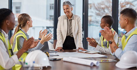 Image showing Applause, talking and construction workers in a meeting with a manager for architecture success. Happy, team and architects clapping for a presentation from a boss about infrastructure design