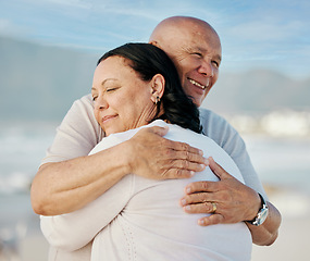 Image showing Happy, love and hug with old couple at beach for travel, support and summer vacation. Relax, bonding and retirement with senior man and woman on seaside holiday for trust, health and marriage