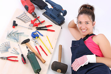 Image showing woman carpenter with work tools 