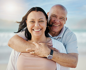 Image showing Beach, portrait and senior couple hug with happy, care and freedom in nature together. Face, love and elderly man embrace woman with smile for retirement, vacation or travel fun ocean holiday in Peru