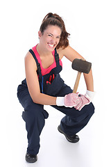 Image showing woman with black rubber mallet 