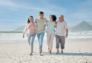 Image showing Love, smile and a family walking on the beach together for summer vacation or holiday in nature. Happy, freedom and travel with senior people, son or daughter outdoor for summer bonding by the ocean