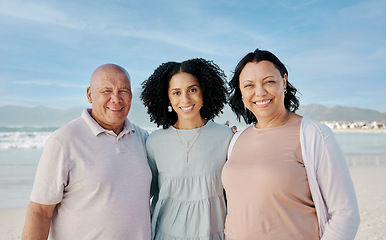 Image showing Portrait of senior parents with woman on beach, smile and embrace on tropical summer holiday in Australia. Ocean, vacation sun and happy family with blue sky, water and love, island travel together.