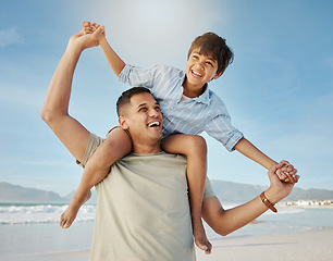 Image showing Father, child on beach with piggy back, smile and playing together in summer waves on tropical island holiday. Fun, dad and boy on ocean vacation with love, support and relax with blue sky in Hawaii.