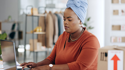 Image showing Black woman, laptop and typing in logistics for schedule delivery, order or ecommerce in fashion business. African American female working on computer in digital marketing for shipping information