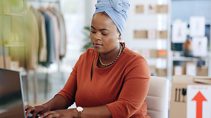 Image showing Black woman, laptop and typing in logistics for schedule delivery, order or ecommerce in fashion business. African American female working on computer in digital marketing for shipping information