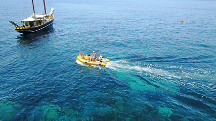 Image showing Group of people on boat, sailing adventure in Greece and summer sun on ocean holiday, relax in freedom and nature. Yacht vacation, family travel and tropical sea cruise to Greek island on blue water.