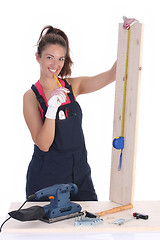 Image showing woman carpenter with wooden plank 