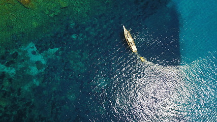 Image showing Aerial, yacht and sailing in water, summer on ocean holiday and relax in freedom with nature from above. Boat vacation, travel in Croatia and tropical cruise on sea adventure to island in mockup.