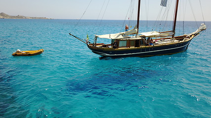 Image showing Boat, sailing in Croatia and sun on ocean holiday, relax in freedom and nature with clean blue water. Luxury yacht vacation, travel in summer and tropical cruise on sea adventure in island beach fun.