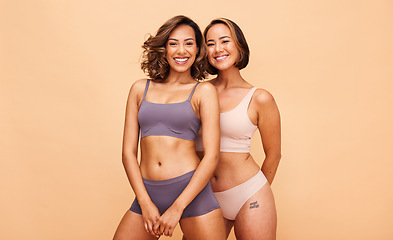 Image showing Beauty, body and smile with portrait of women in studio for health, diversity and cosmetics. Spa, self love and skincare with people on beige background for support, pride and solidarity on mockup