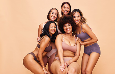 Image showing Portrait, diversity and women with beauty, cosmetics and body positivity on a beige studio background. Models, smile or group with self love, inclusion and wellness with health, aesthetic and friends