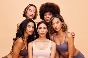 Image showing Diversity, beauty and portrait, group of women with self love and solidarity in studio together. Cosmetics on face, power people on beige background with underwear, skincare and makeup for equality.