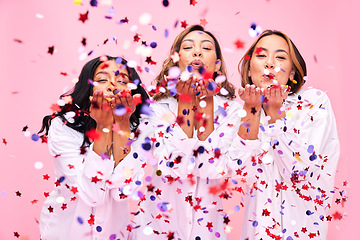 Image showing Blow, confetti and portrait of women in studio for celebration, underwear sale and discount. Beauty, diversity and female people on pink background for cosmetics, natural skincare and wellness