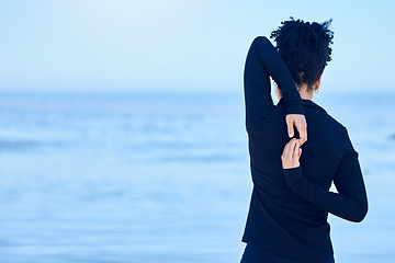 Image showing Back, beach and woman with exercise, stretching and wellness with sports, workout and cardio with performance. Person, outdoor or athlete stretch arms, training or mockup space with health or fitness