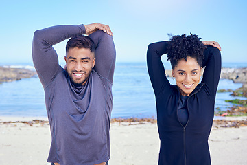 Image showing Beach portrait, exercise and happy couple stretching arm for outdoor sports, fitness and athlete start workout. Teamwork, happiness and relax nature team doing partner warm up, wellness or training