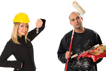 Image showing businesswoman and house painter 