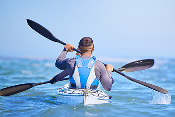 Image showing Water, man and woman in kayak from back and sports on lake, beach or river for exercise team. Ocean holiday, adventure and fitness, couple in canoe for training workout with teamwork in travel on sea