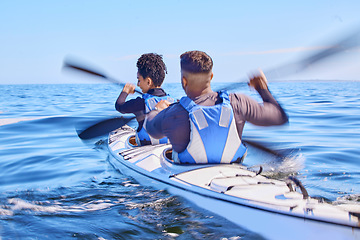 Image showing Water, man and woman in kayak for race on lake, beach or river for exercise together on vacation. Ocean holiday, adventure and fitness, couple in canoe for training workout in teamwork on blue sky.