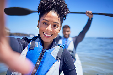 Image showing Ocean, kayak and couple with selfie, beach and summer vacation with memory, honeymoon and social media. Portrait, post and man with woman, water sports and picture with love, training and holiday