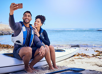 Image showing Selfie, kayak and a couple on the beach in summer together for freedom, vacation or holiday travel. Relax, love or smile with a sports man and woman on a boat by the ocean or sea for adventure