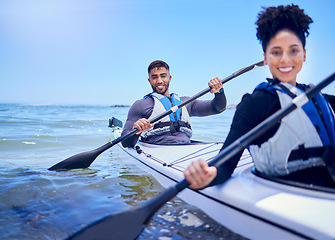 Image showing Water, man and woman in kayak at lake, beach or river for exercise in sports at sea in portrait. Ocean holiday, adventure and fitness, happy couple with smile rowing in canoe at training or challenge