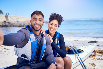 Image showing Selfie, kayak and a couple on the beach to relax in summer together for freedom, vacation or holiday travel. Portrait, love or smile with a sports man and woman on a boat by the ocean for adventure