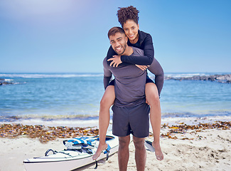 Image showing Sports, fitness and kayak couple piggyback at a beach for training, bond and workout in nature together. Kayaking, portrait and man carrying woman at sea for rowing adventure, workout or fun hobby