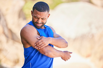 Image showing Arm pain, sport and man outdoor, accident and fitness exercise in training workout. Body injury, shoulder or arthritis of athlete, muscle problem or fibromyalgia in medical emergency for osteoporosis