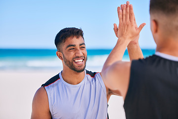 Image showing Happy man, high five and teamwork in fitness on beach for workout success, training or outdoor exercise. Excited male person smile or friends in happiness or sports motivation together on ocean coast