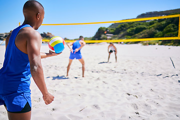 Image showing Beach, volleyball or sports team serve ball, playing competition and exercise for group tournament, fitness or game. Nature, sand or back of player workout, training and practice for athlete teamwork