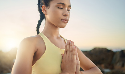 Image showing Yoga, hands or woman in meditation at sunrise in nature for calm relaxing peace, wellness or mindfulness. Chakra, gratitude or healthy spiritual girl in zen lotus pose breathing to meditate or focus