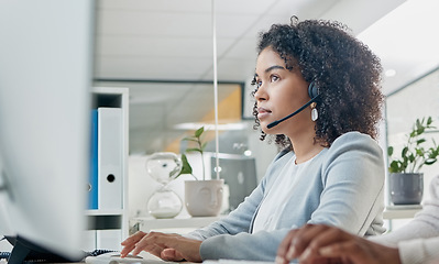 Image showing Crm, contact us or black woman in call center at customer services for a communication or telemarketing agency. Computer, microphone or African consultant talking, helping or speaking at office desk