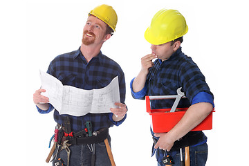 Image showing Two construction workers with architectural plans 