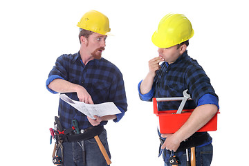 Image showing Two construction workers with architectural plans 