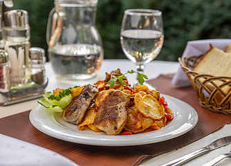 Image showing Veal medallions with roasted vegetables