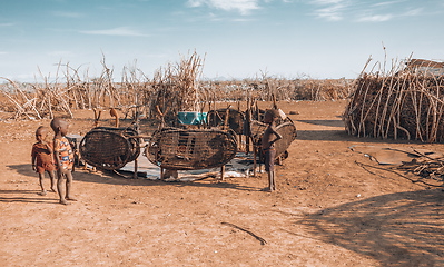 Image showing Dasanesh children in village, Omorate, Omo Valley, Ethiopia